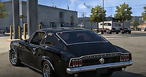 Concept art: rear view of a black fastback car at a fuel station